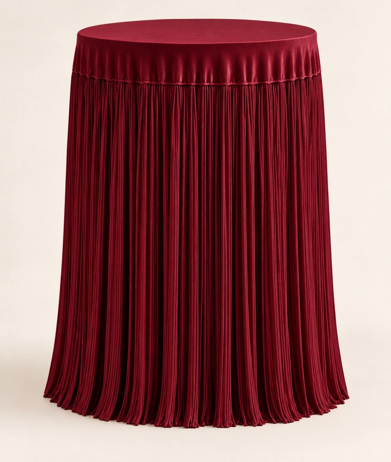 White handmade fringe cocktail tablecloth with flowing floor-length fringe and a smooth fabric top, displayed on a round cocktail table.